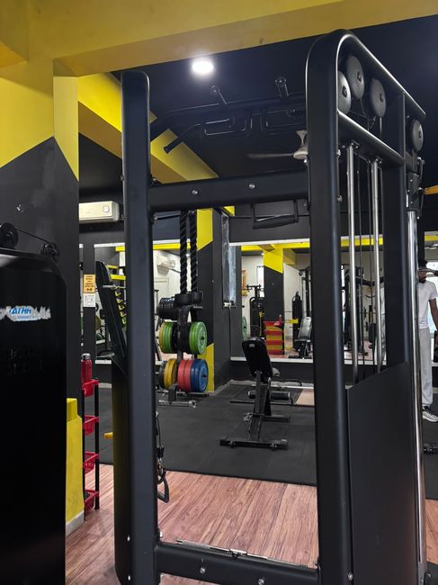 Dual adjustable pulley cable crossover machine with accessories at Tathhastu Fitness